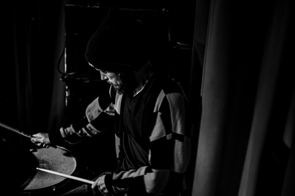 He Drums for the Stokelys