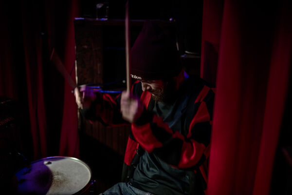 He Wears Sweaters and Beats Drums