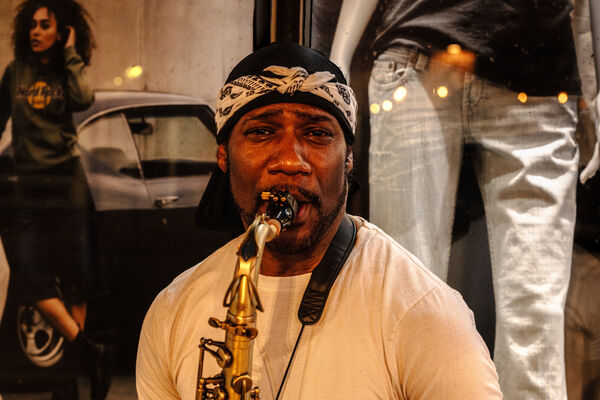 Saxaphonist with Distractions